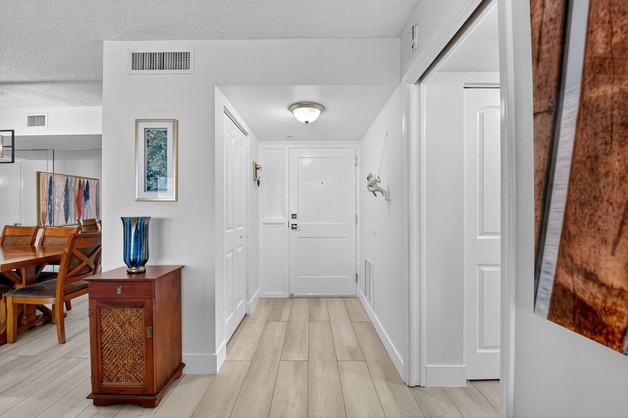 3400 North Ocean Drive, Unit 405 Riviera Beach, FL 33404 - Photo 3 of 58 a view of a hallway with workspace and a window