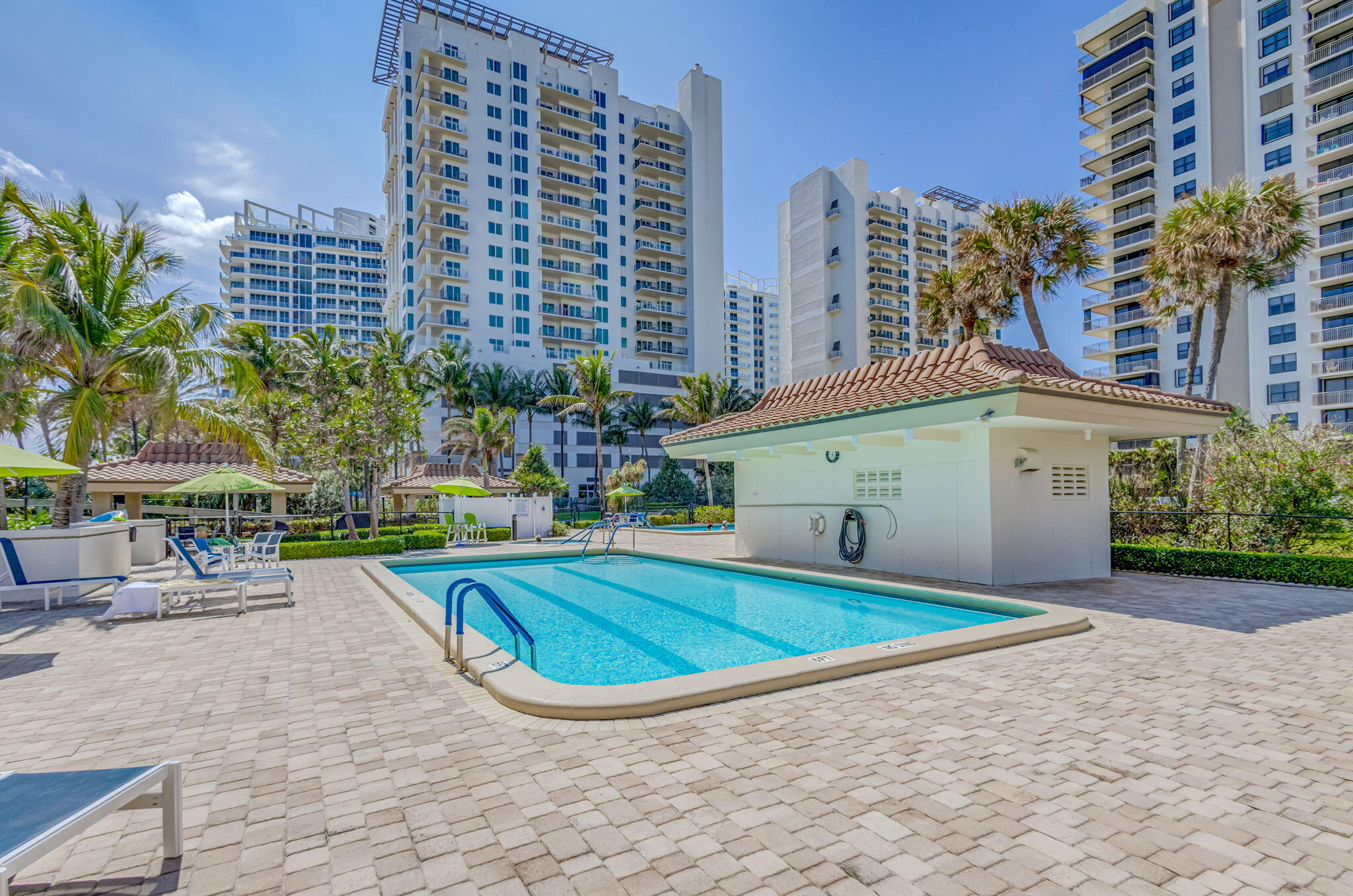 3400 North Ocean Drive, Unit 405 Riviera Beach, FL 33404 - Photo 40 of 58 a view of a swimming pool with a outdoor space