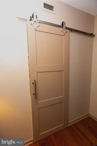 a bathroom with a sink and cabinets