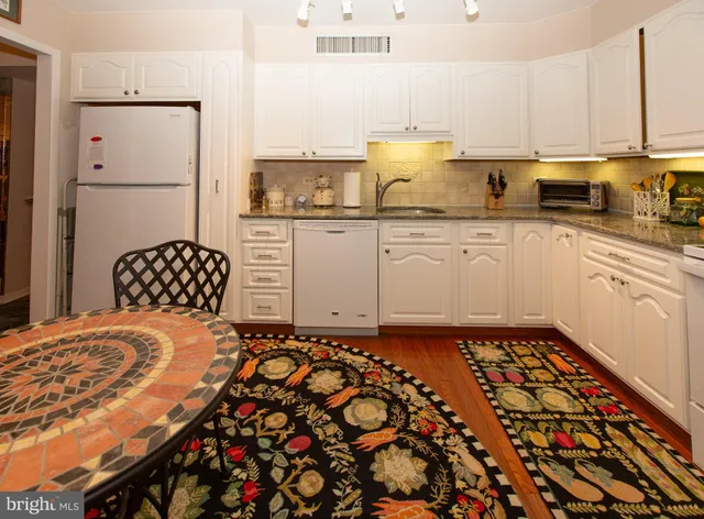 a view of a livingroom with furniture and window