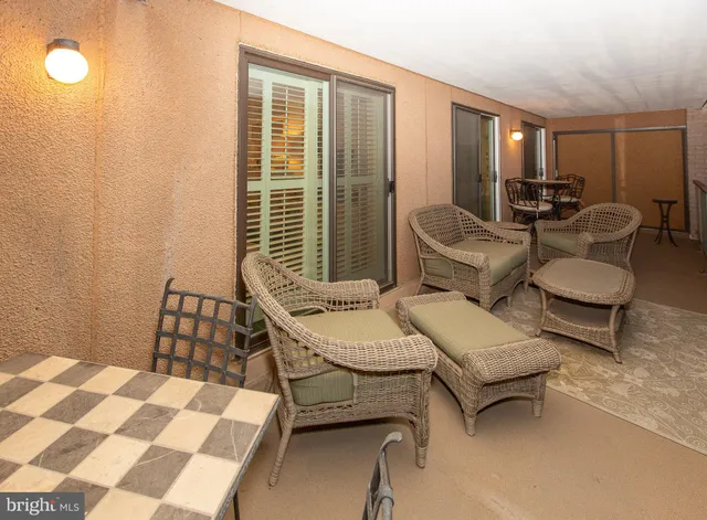 a front view of a house with a porch