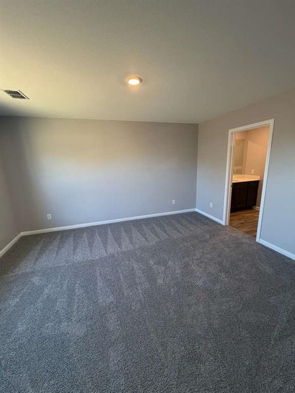 8008 Ravalli Street Ponder, TX 76259 - Photo 11 of 12 a view of an empty room with a window
