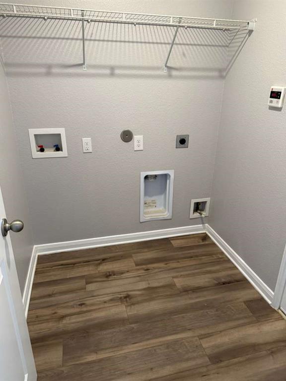 8008 Ravalli Street Ponder, TX 76259 - Photo 12 of 12 a view of a room with wooden floor and fan