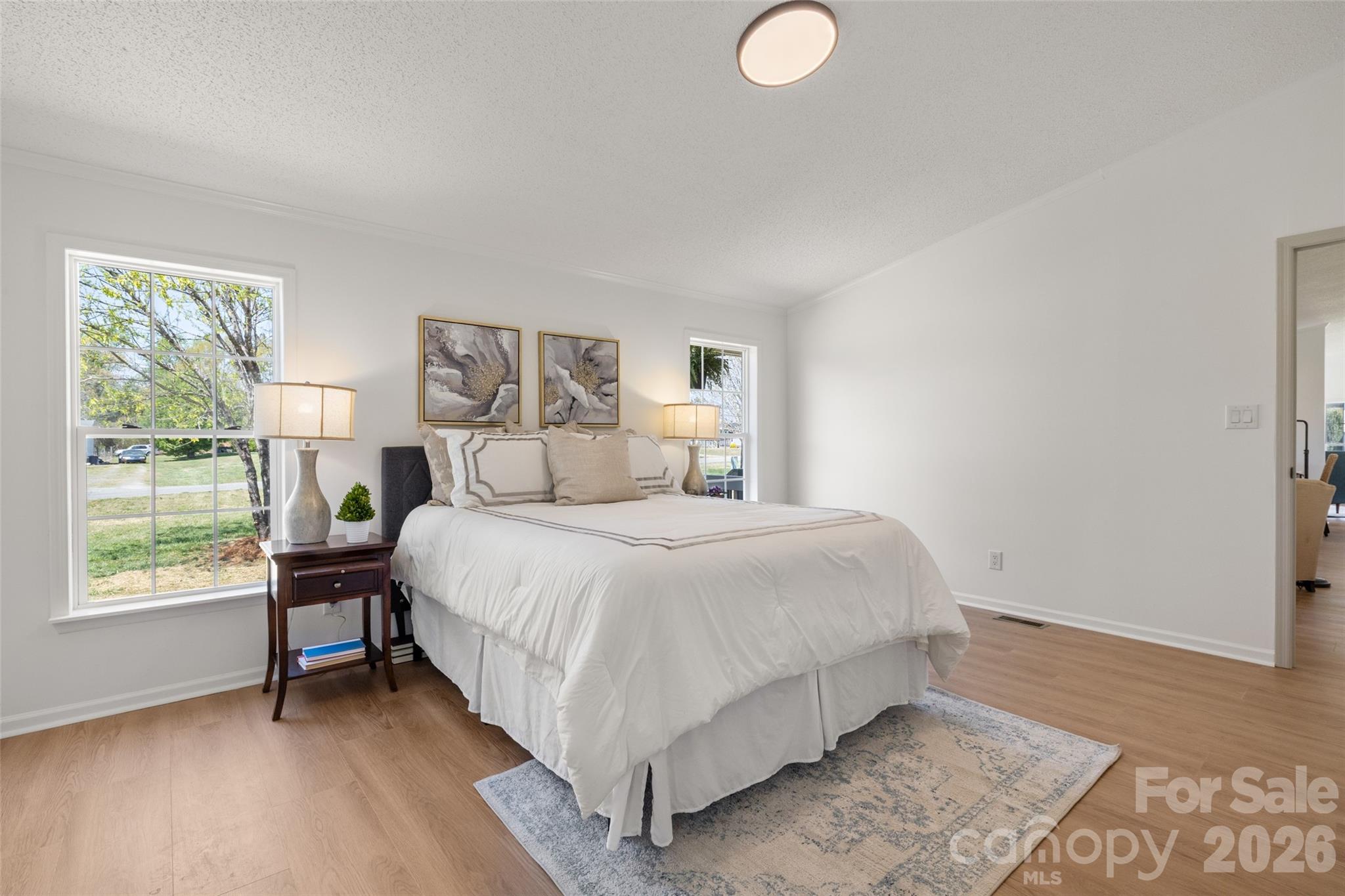 161 Baxter Way Forest City, NC 28043 - Photo 17 of 31 a bedroom with a bed and a window