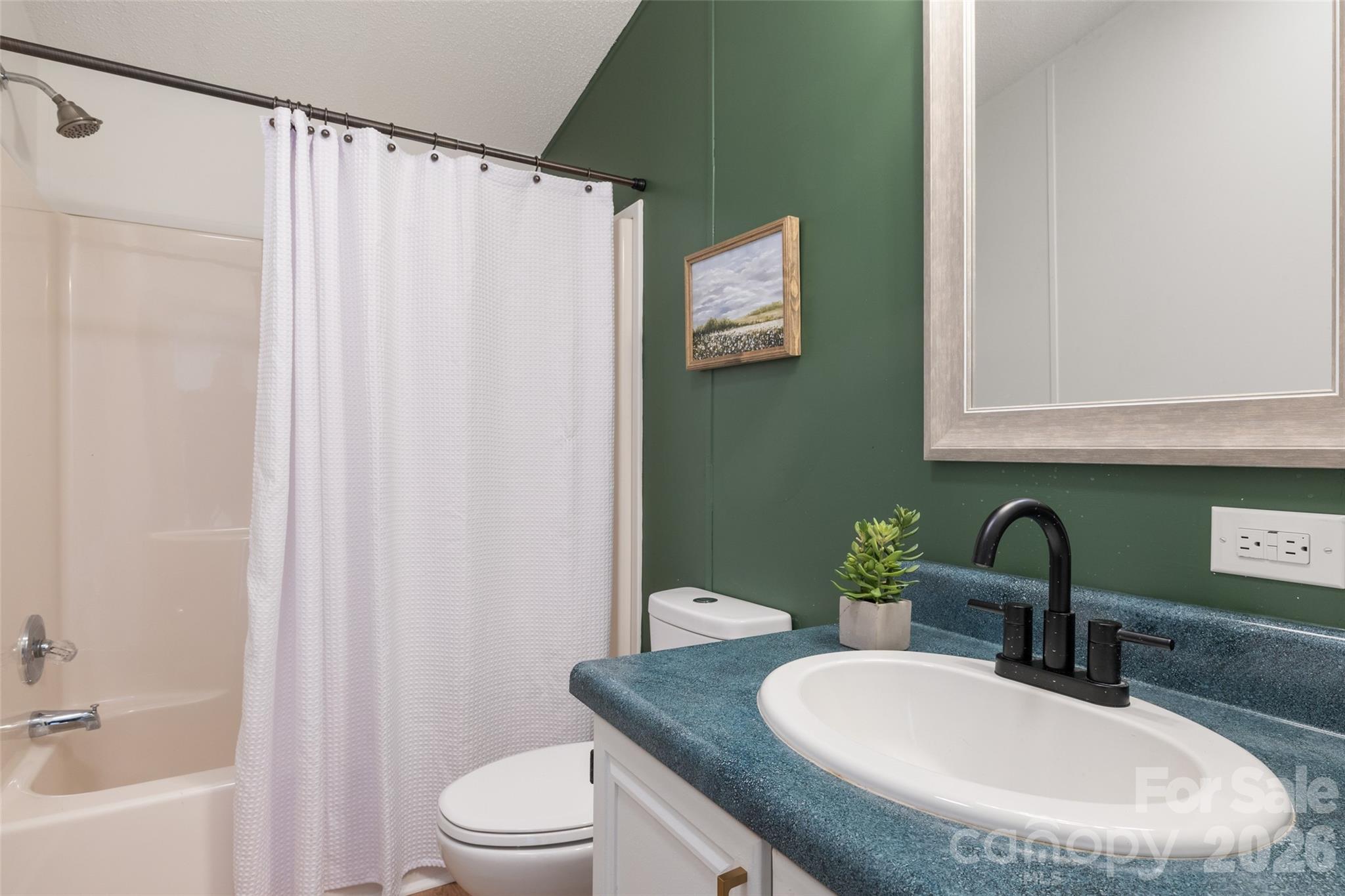 161 Baxter Way Forest City, NC 28043 - Photo 24 of 31 a bathroom with a sink toilet and shower