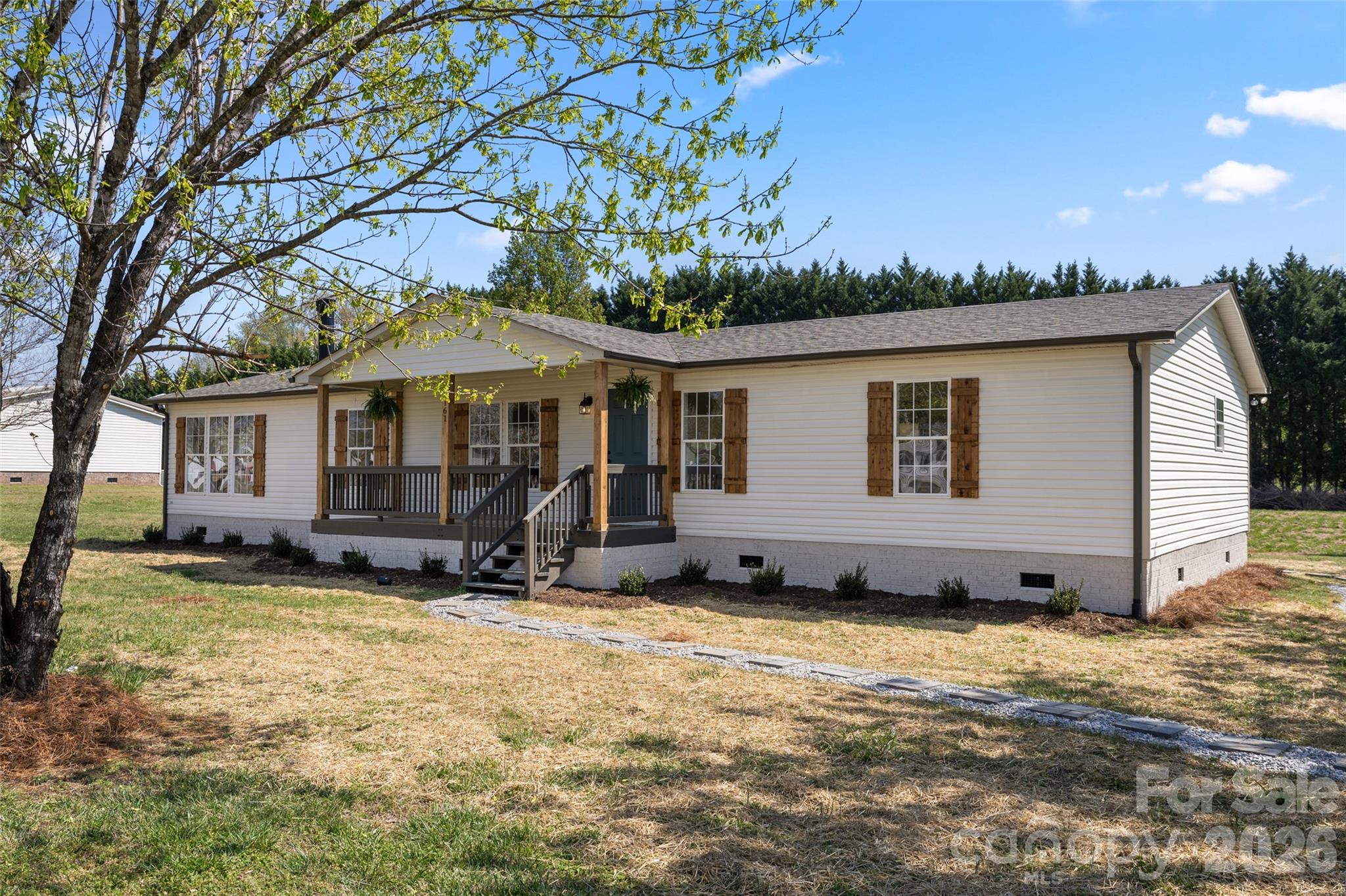161 Baxter Way Forest City, NC 28043 - Photo 27 of 31 a view of a house with a yard