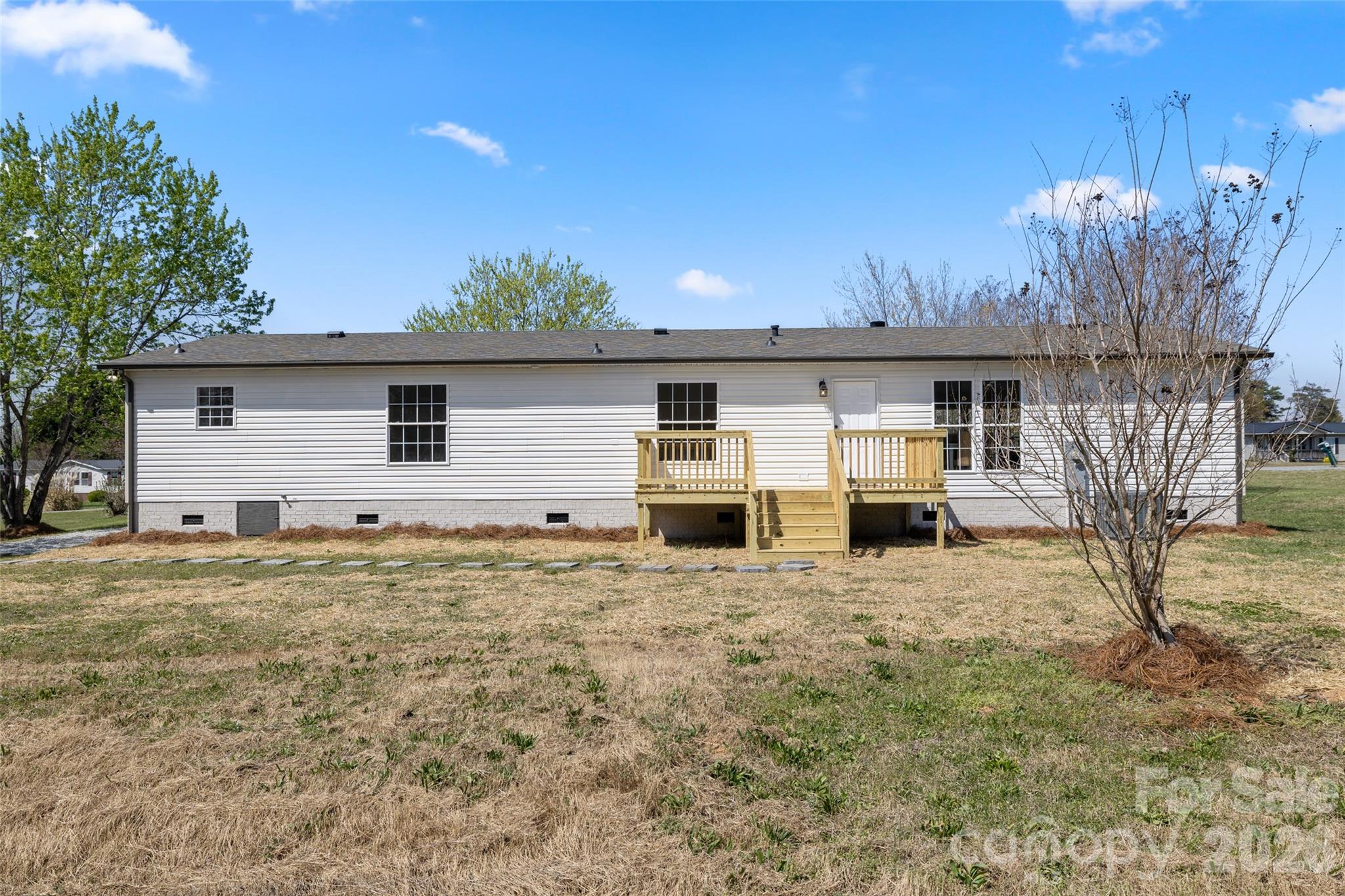 161 Baxter Way Forest City, NC 28043 - Photo 29 of 31 a house with trees in the background