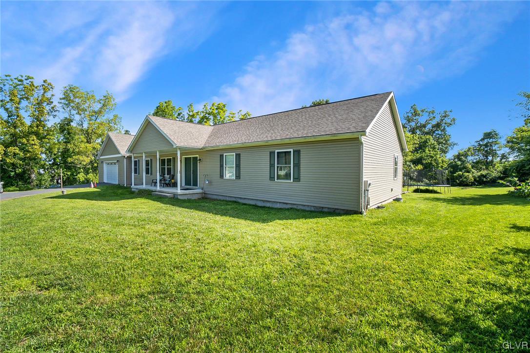 1103 Bushkill Center Road Nazareth, PA 18064 - Photo 15 of 47 a view of a house with a backyard
