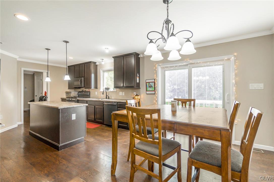 1103 Bushkill Center Road Nazareth, PA 18064 - Photo 24 of 47 a large kitchen with a table and chairs