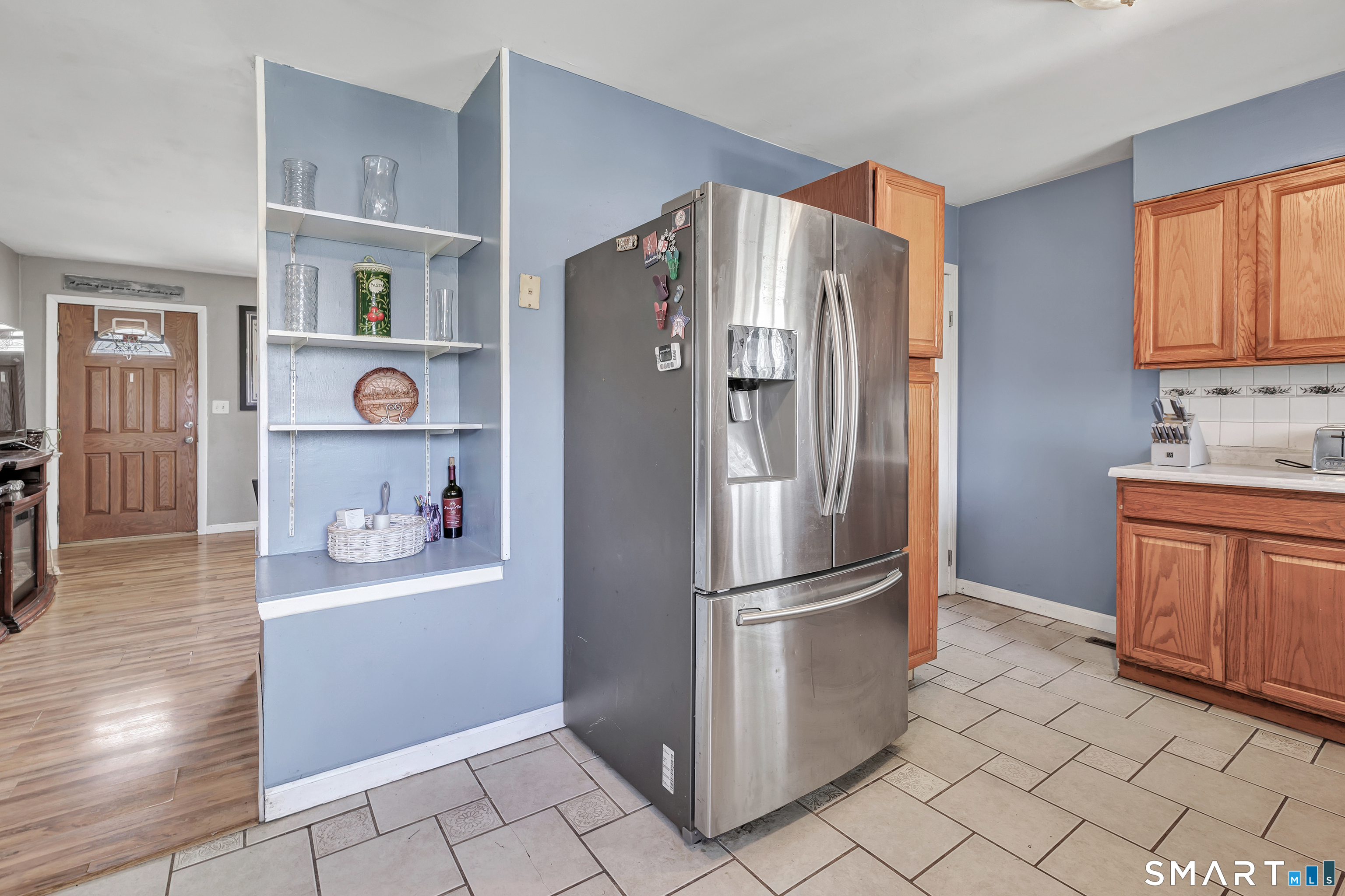 9 Alan Drive Ansonia, CT 06401 - Photo 14 of 34 a kitchen with stainless steel appliances a refrigerator and a sink