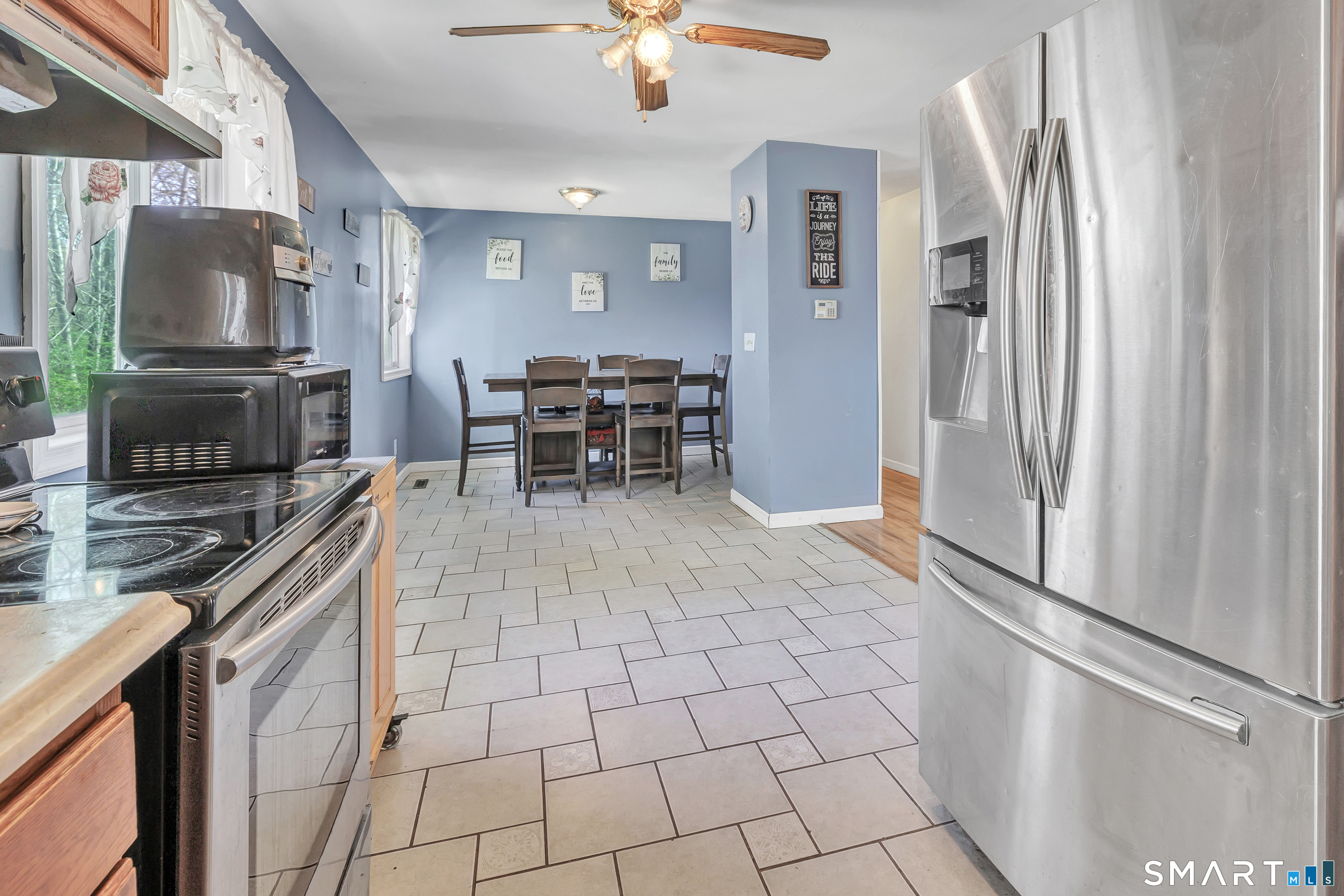 9 Alan Drive Ansonia, CT 06401 - Photo 15 of 34 a kitchen with stainless steel appliances granite countertop a refrigerator and a sink