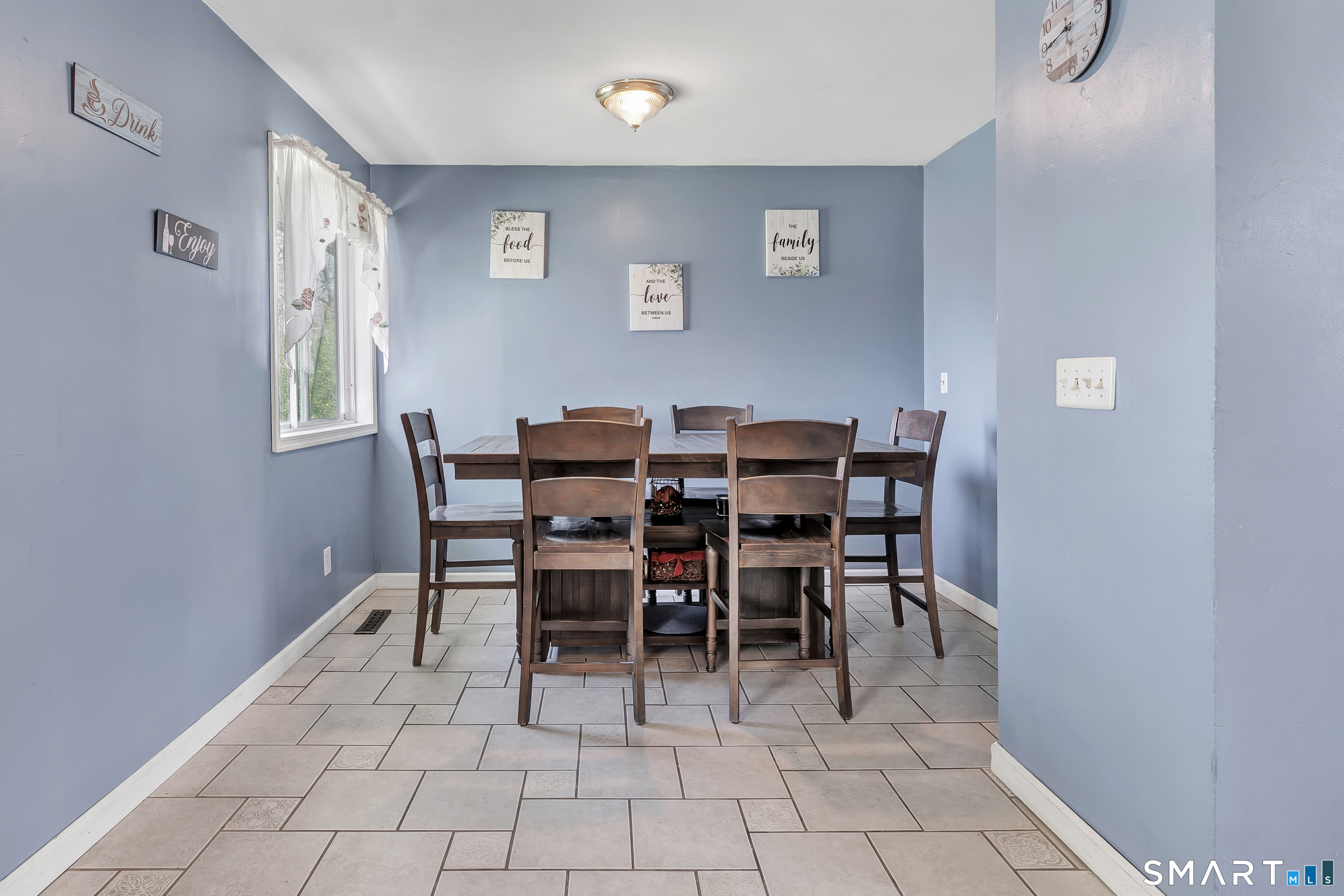 9 Alan Drive Ansonia, CT 06401 - Photo 17 of 34 a dining room with furniture and window