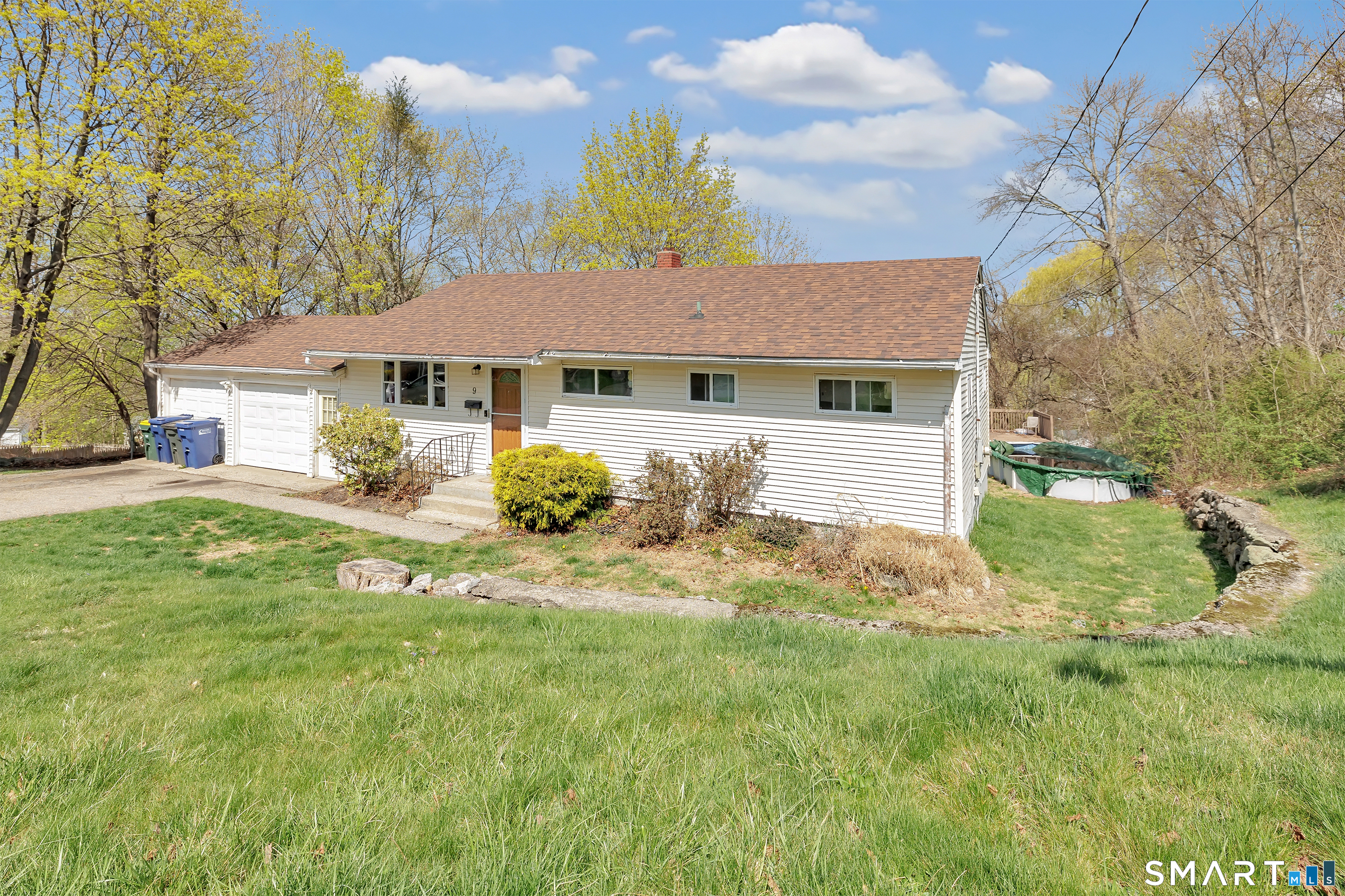 9 Alan Drive Ansonia, CT 06401 - Photo 2 of 34 a front view of a house with garden