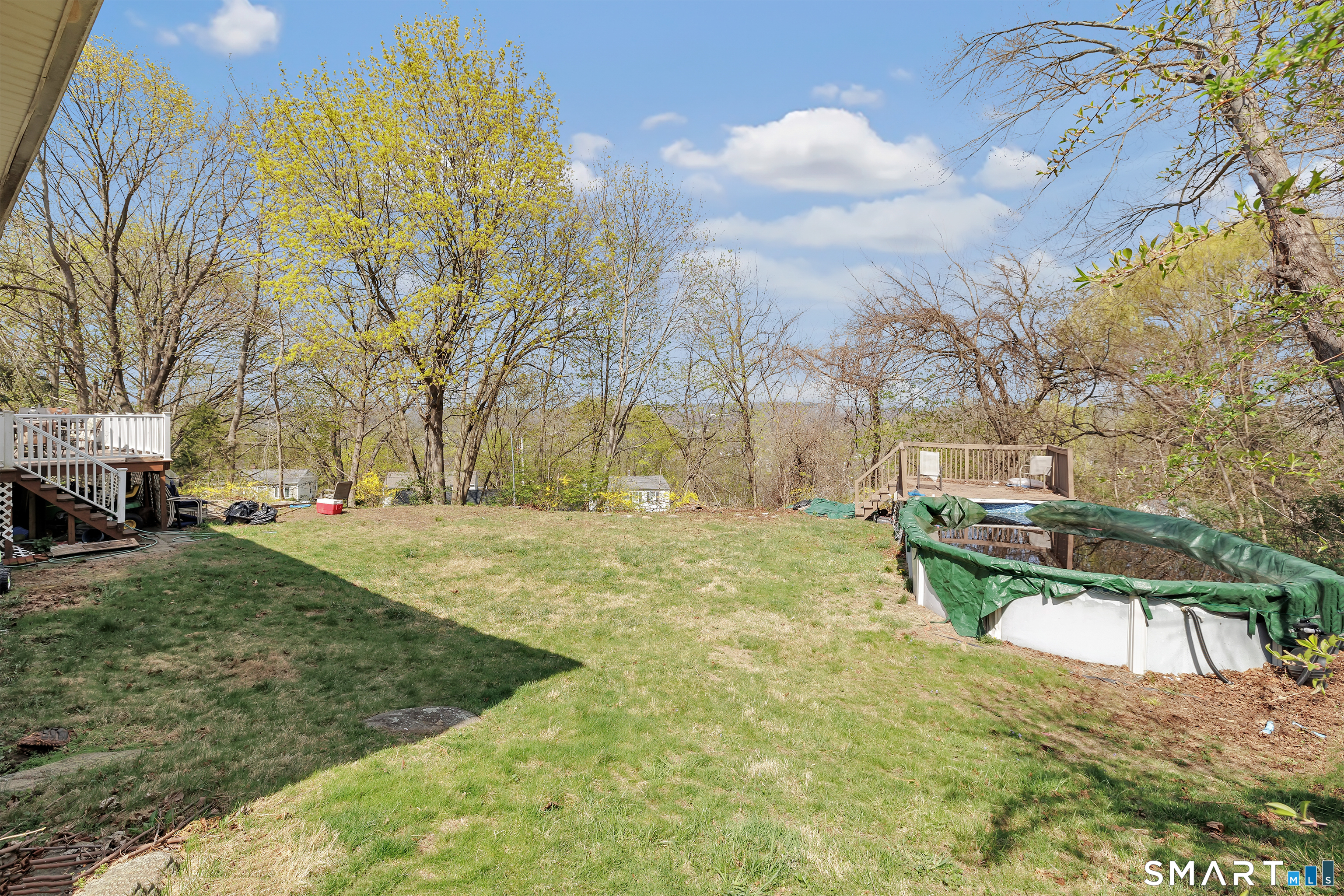 9 Alan Drive Ansonia, CT 06401 - Photo 34 of 34 a view of a garden with a bench