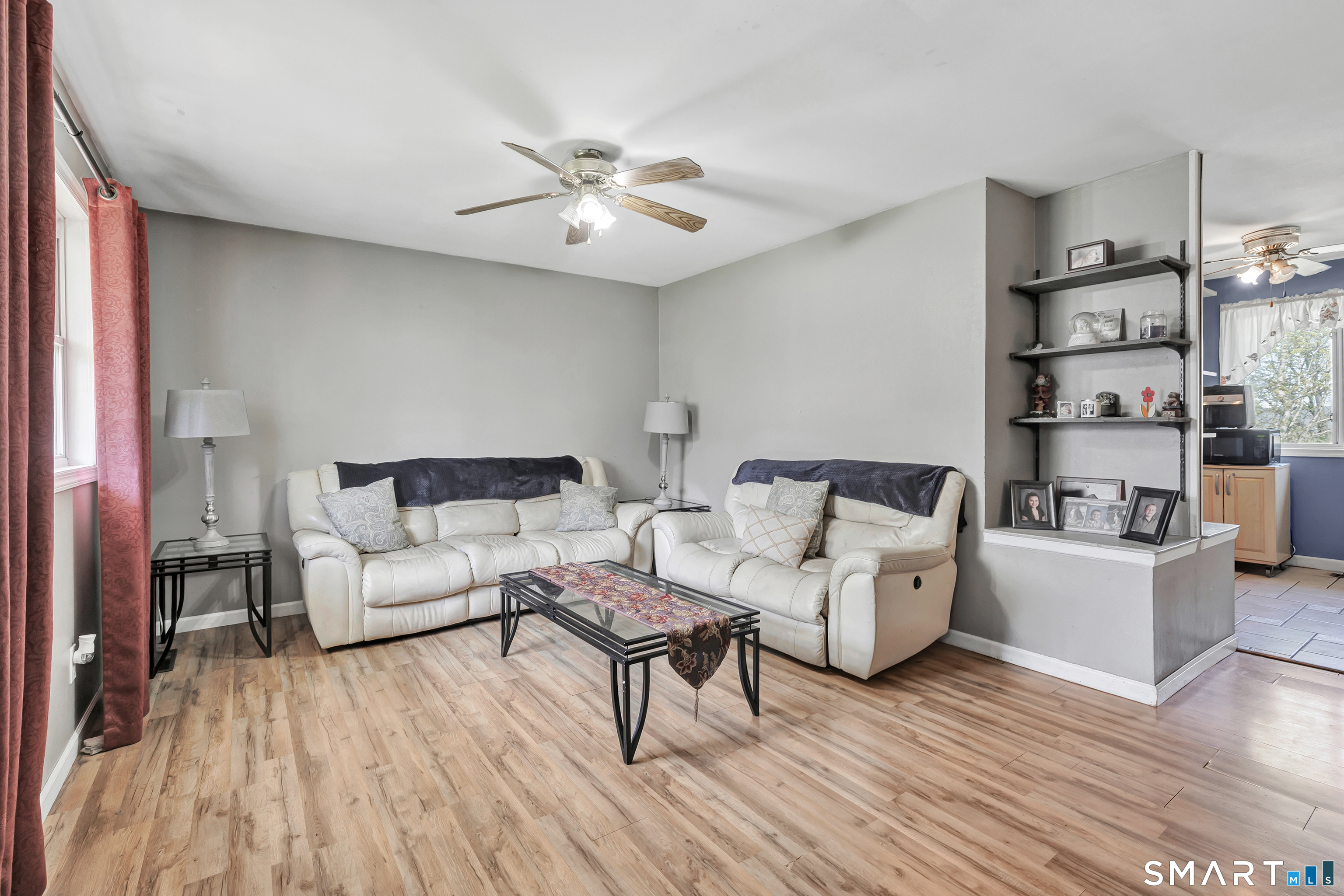 9 Alan Drive Ansonia, CT 06401 - Photo 6 of 34 a living room with furniture and wooden floor