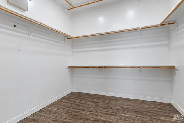 a view of an empty walk in closet