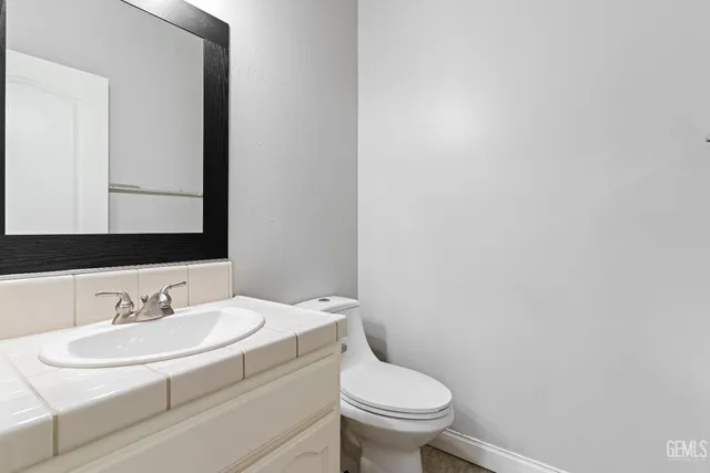 a bathroom with a sink and a toilet