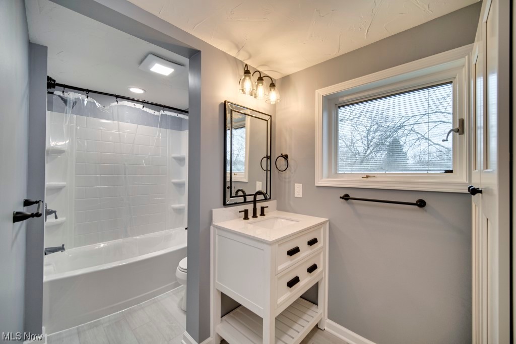 7060 Lear Nagle Road North Ridgeville, OH 44039 - Photo 28 of 29 Full bathroom with toilet, bathtub / shower combination, and oversized vanity