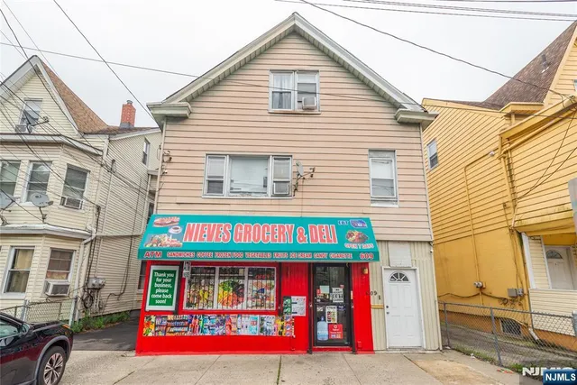 a view of small white building