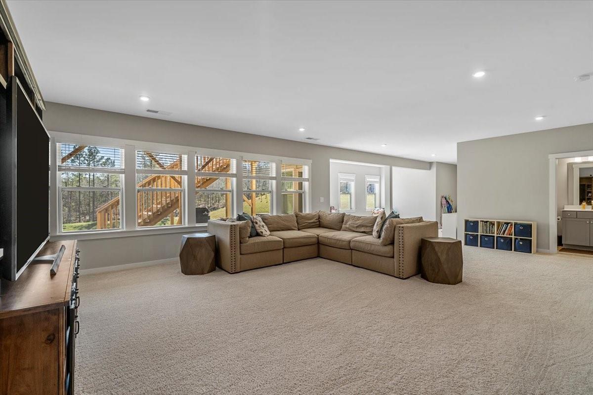 3728 Rustic Pne Way Clover, SC 29710 - Photo 25 of 48 a living room with furniture and large windows
