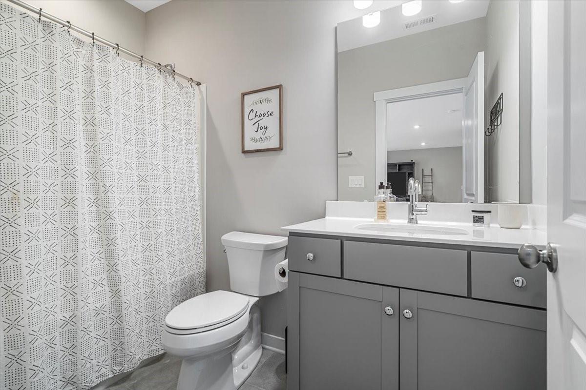 3728 Rustic Pne Way Clover, SC 29710 - Photo 29 of 48 a bathroom with a sink toilet and shower