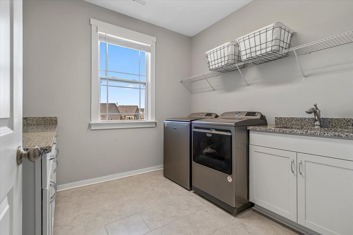 3728 Rustic Pne Way Clover, SC 29710 - Photo 33 of 48 a kitchen with stainless steel appliances granite countertop a stove and a refrigerator