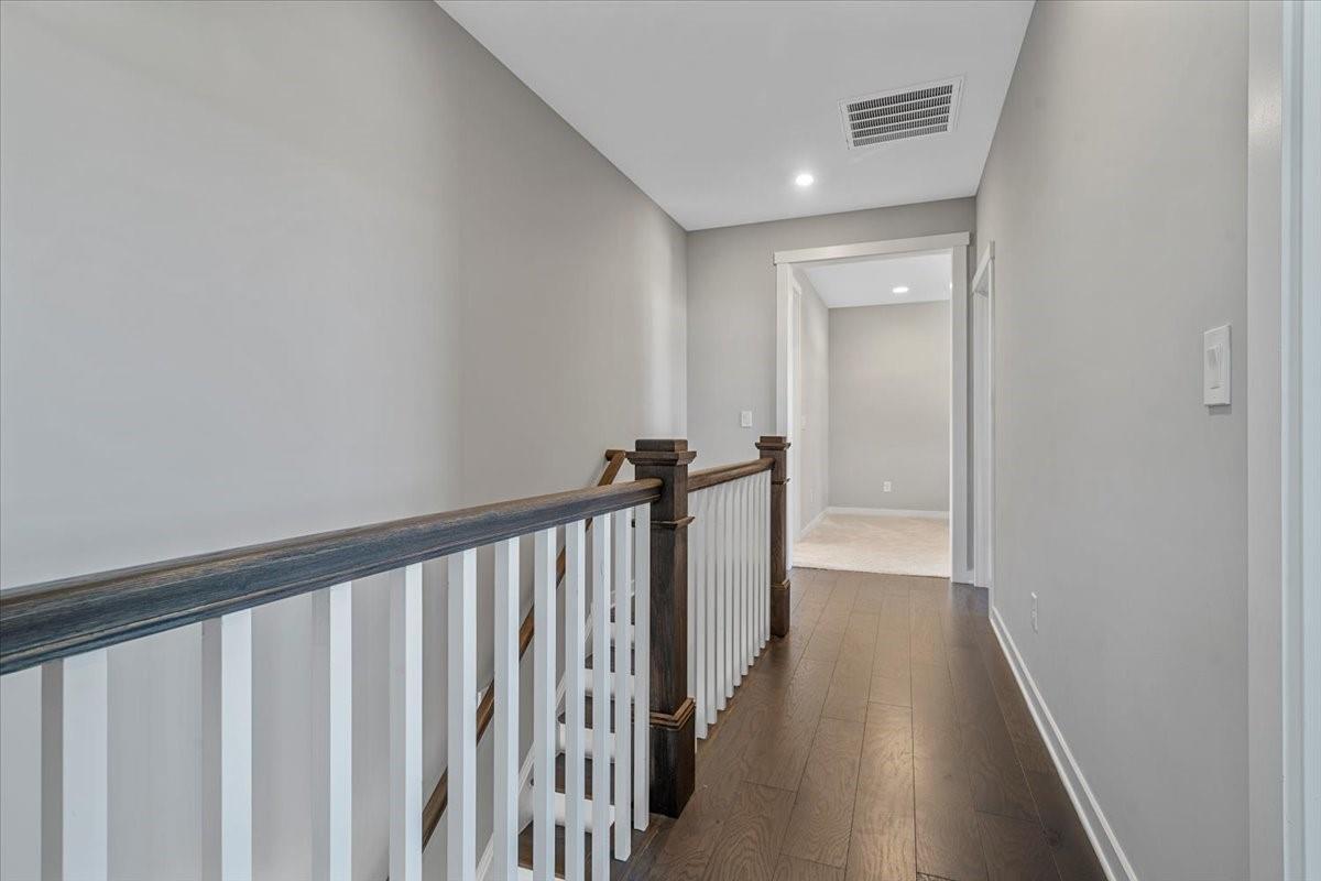 3728 Rustic Pne Way Clover, SC 29710 - Photo 34 of 48 a view of a hallway with wooden floor