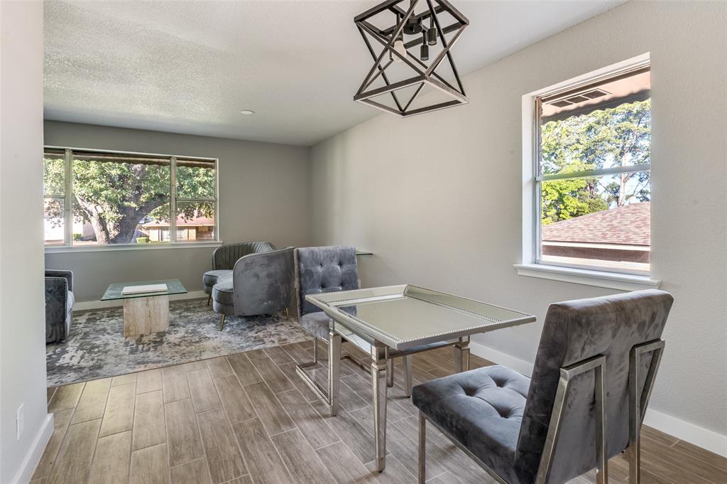 1287 Whispering Trail Dallas, TX 75241 - Photo 8 of 24 a living room with furniture and a window