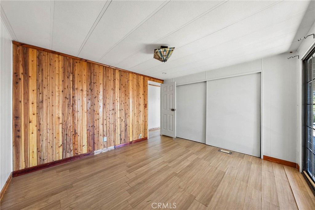 3360 Yuba Street Nice, CA 95464 - Photo 18 of 50 a view of an empty room with wooden floor