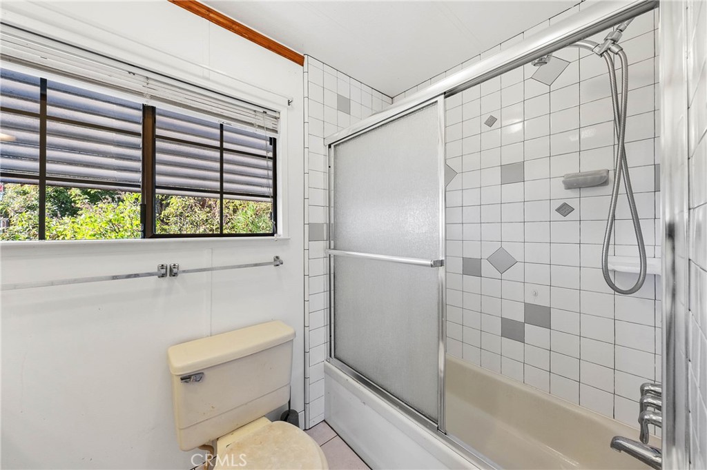 3360 Yuba Street Nice, CA 95464 - Photo 20 of 50 a bathroom with a toilet and a shower