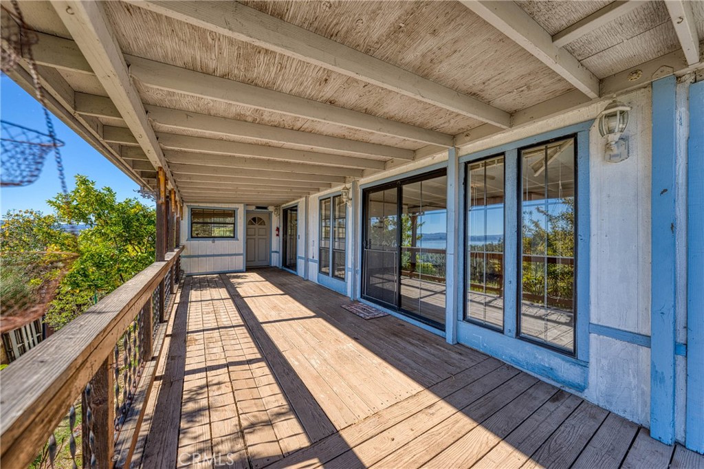 3360 Yuba Street Nice, CA 95464 - Photo 37 of 50 a view of balcony with wooden floor
