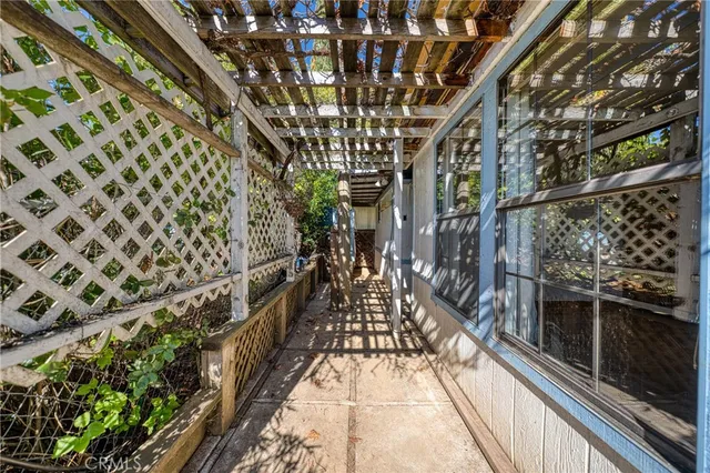 a view of a yard with an outdoor space