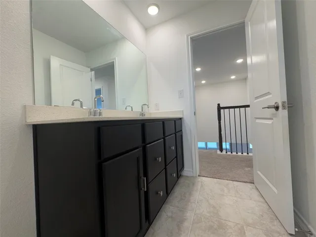 a kitchen with a sink and washing machine