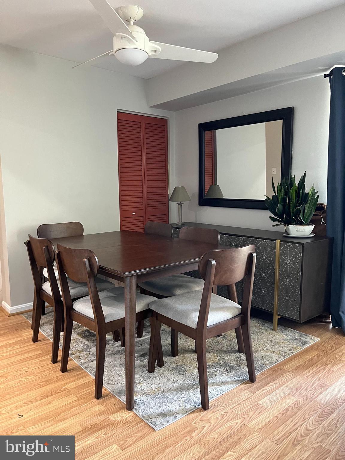 6153 Edsall Road, Unit E Alexandria, VA 22304 - Photo 2 of 12 a dining room with furniture and wooden floor