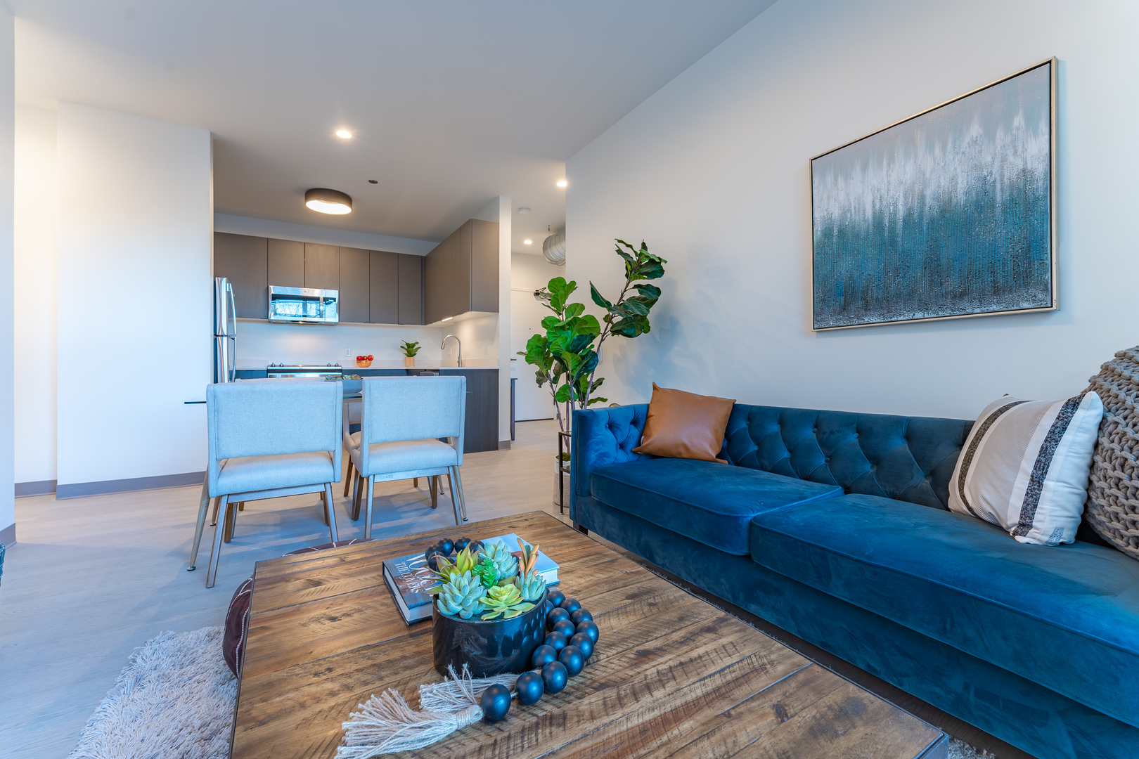 Undisclosed Address Chicago, IL 60642 - Photo 6 of 15 a living room with furniture and flowers