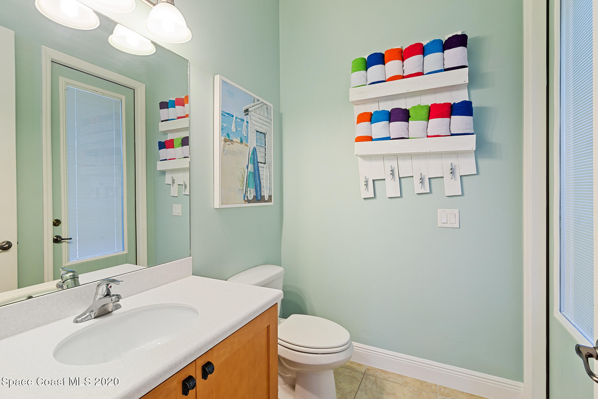 1162 Tralee Bay Avenue Melbourne, FL 32940 - Photo 14 of 34 Half bath downstairs