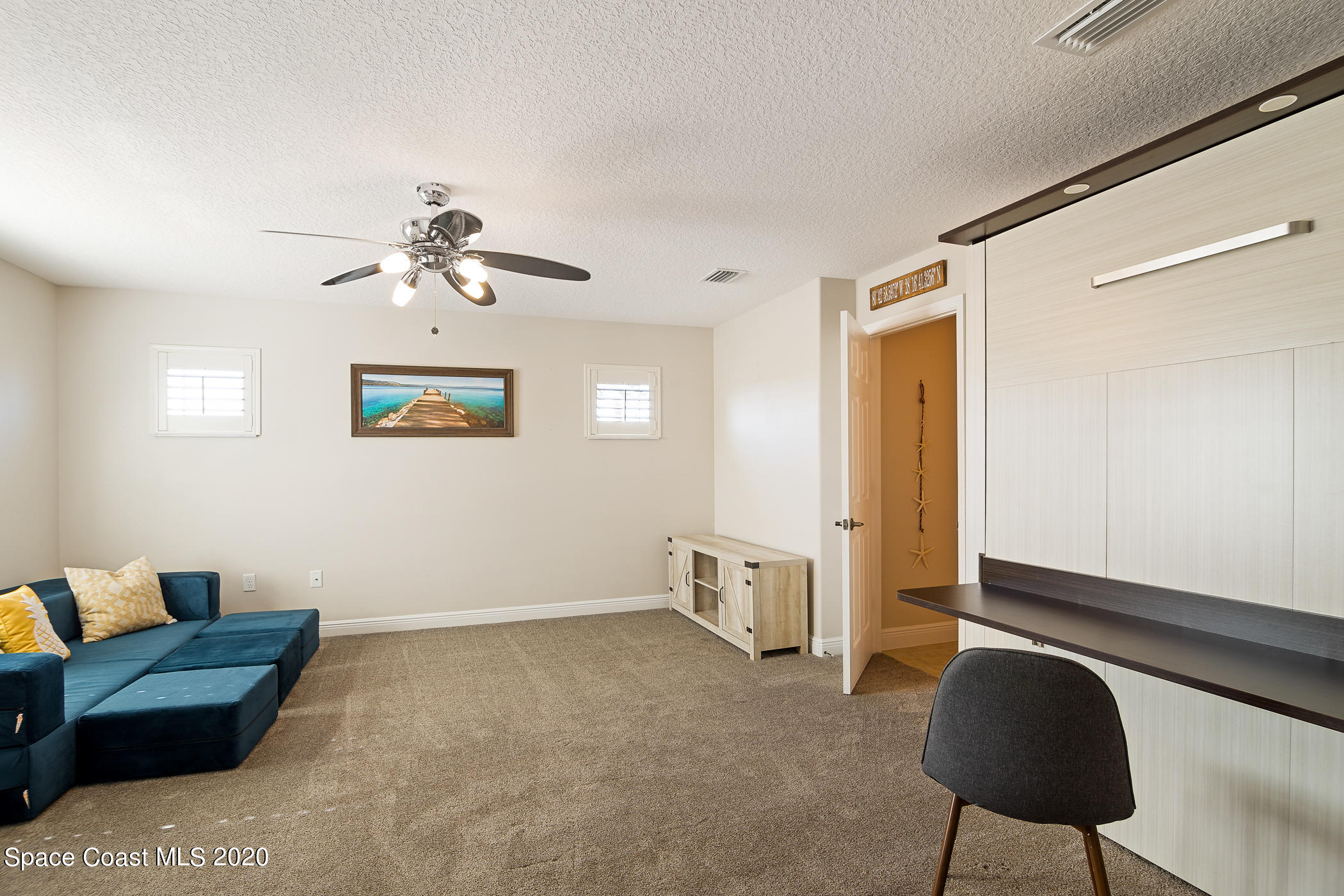 1162 Tralee Bay Avenue Melbourne, FL 32940 - Photo 22 of 34 Upstairs loft with Murphey bed