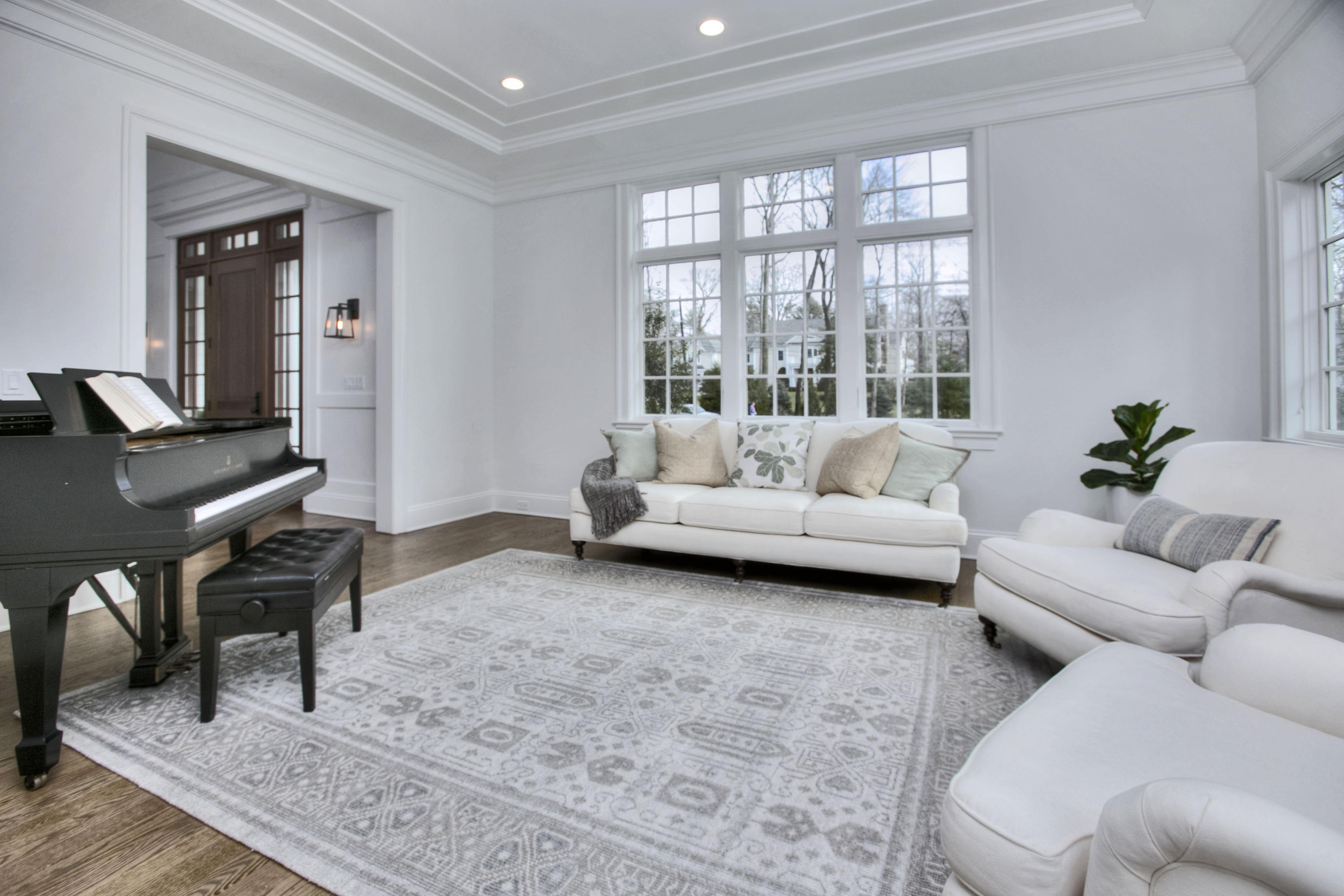 61 Stony Brook Road Darien, CT 06820 - Photo 11 of 43 a living room with furniture and a large window