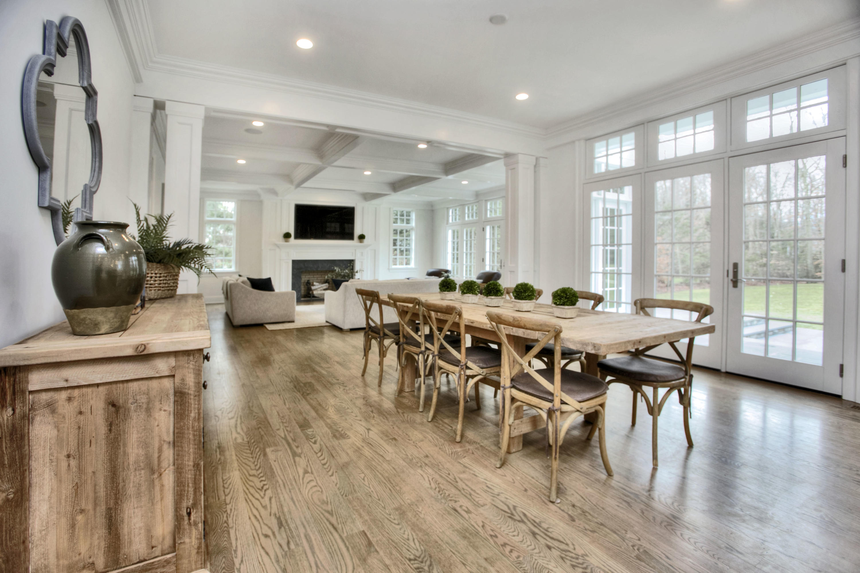 61 Stony Brook Road Darien, CT 06820 - Photo 18 of 43 a view of a dining room with furniture and wooden floor