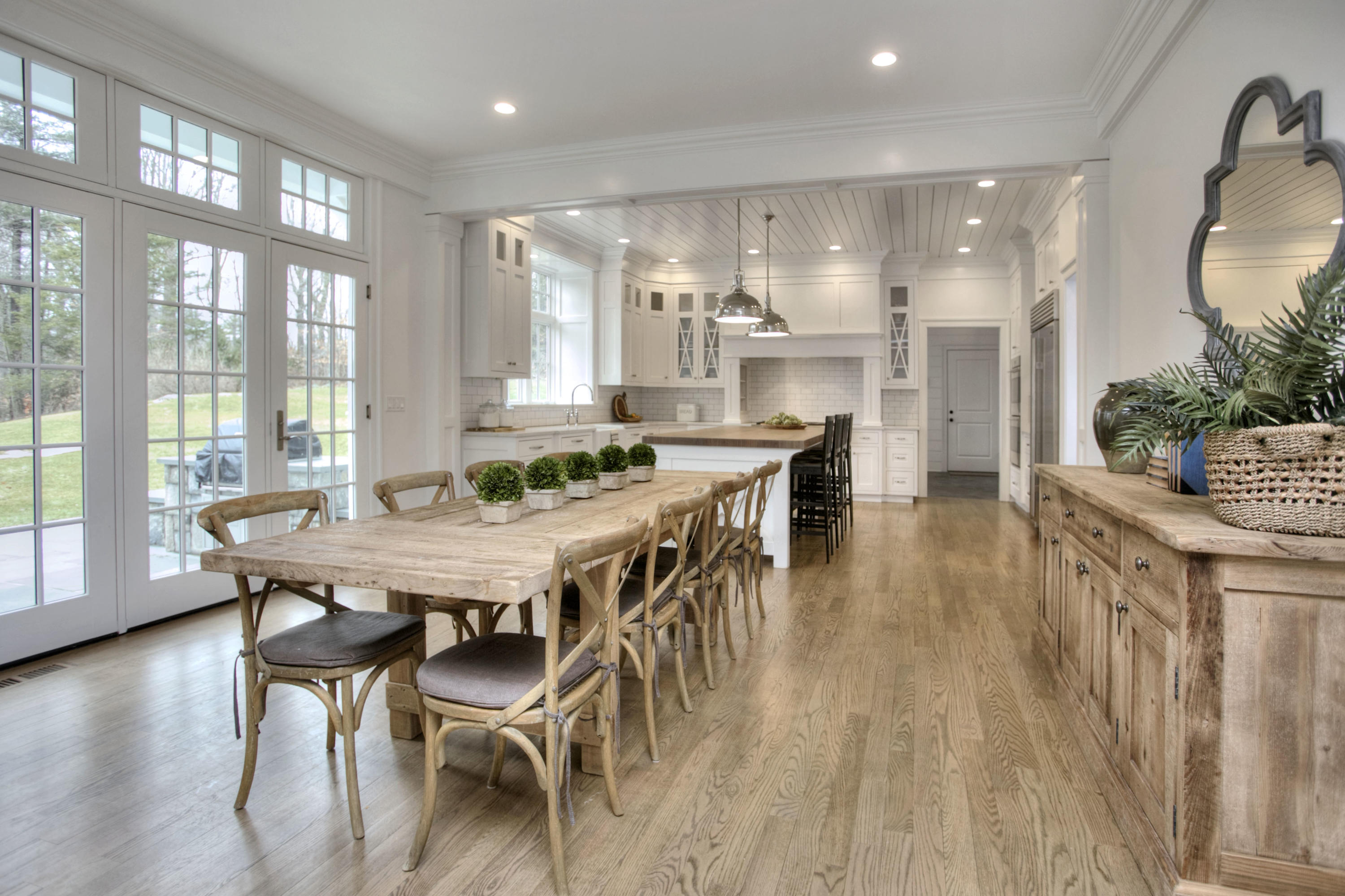 61 Stony Brook Road Darien, CT 06820 - Photo 19 of 43 a dining room with furniture and wooden floor