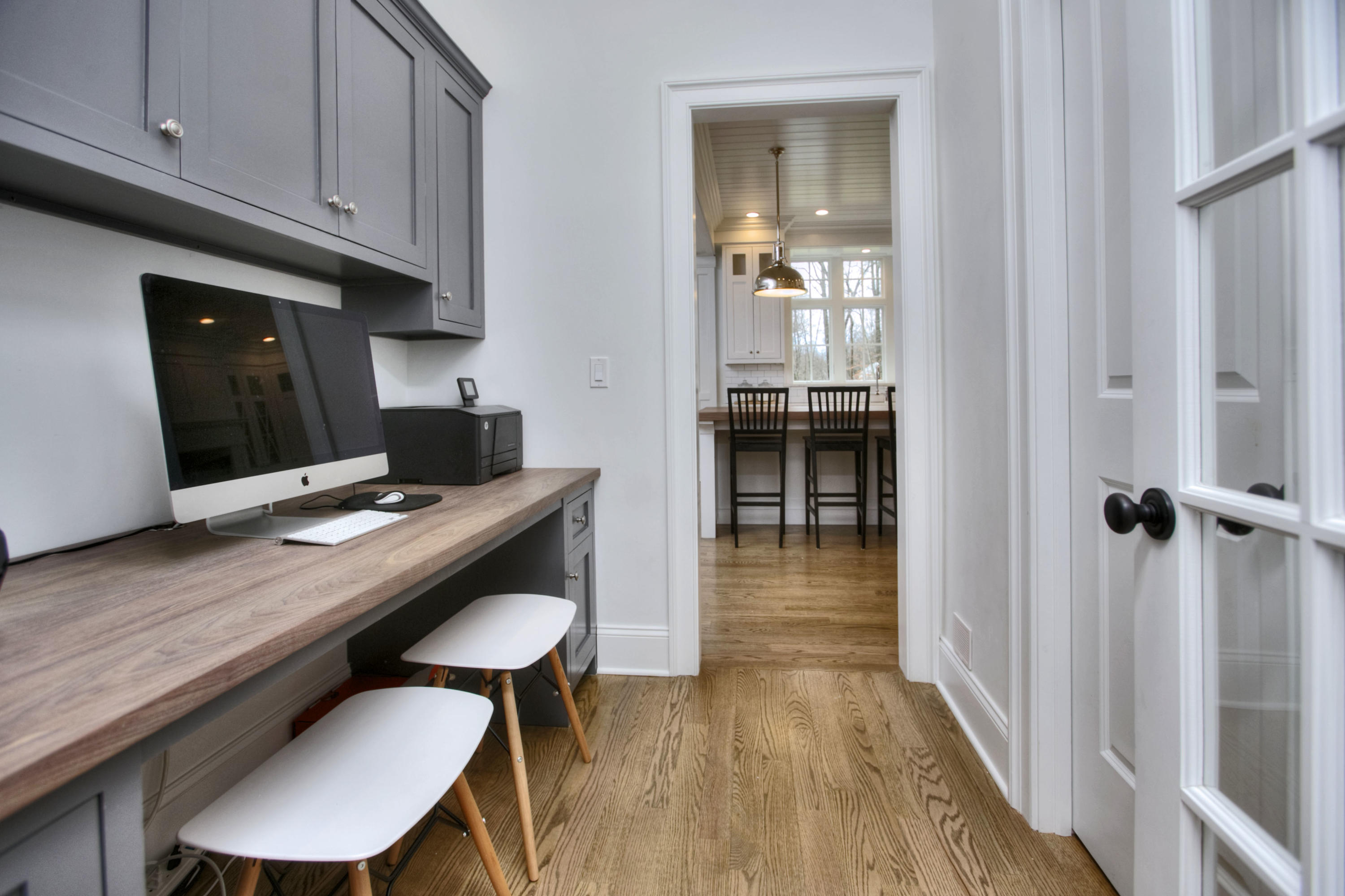 61 Stony Brook Road Darien, CT 06820 - Photo 21 of 43 a workspace with furniture and wooden floor