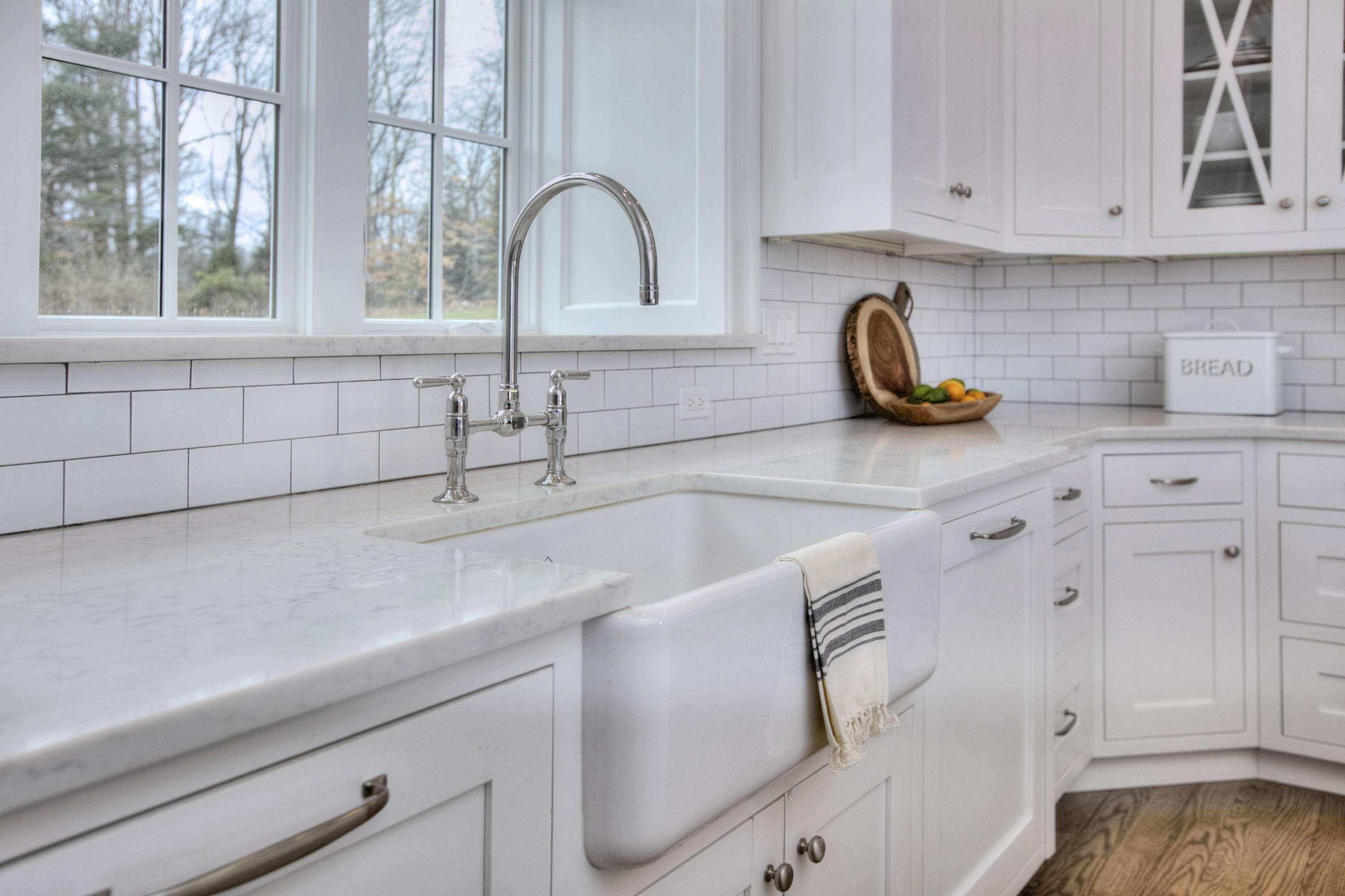 61 Stony Brook Road Darien, CT 06820 - Photo 22 of 43 a kitchen with a sink and cabinets