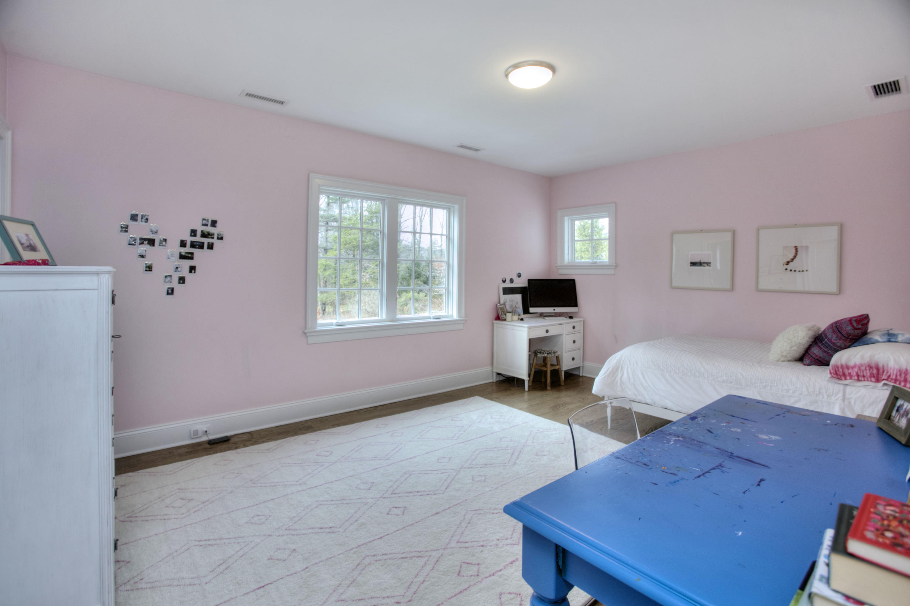 61 Stony Brook Road Darien, CT 06820 - Photo 37 of 43 a bedroom with furniture and a window