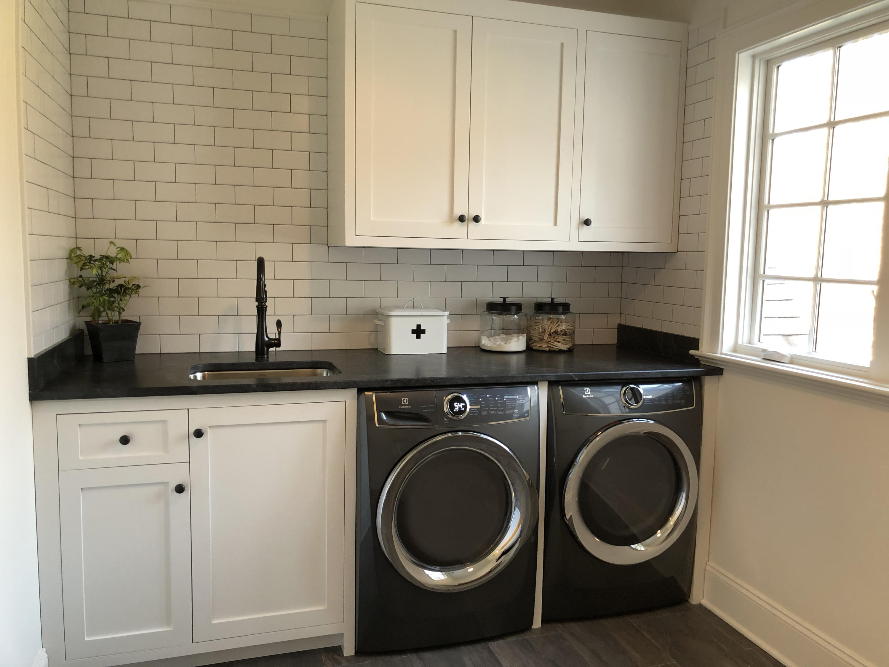 61 Stony Brook Road Darien, CT 06820 - Photo 38 of 43 a utility room with sink dryer and washer