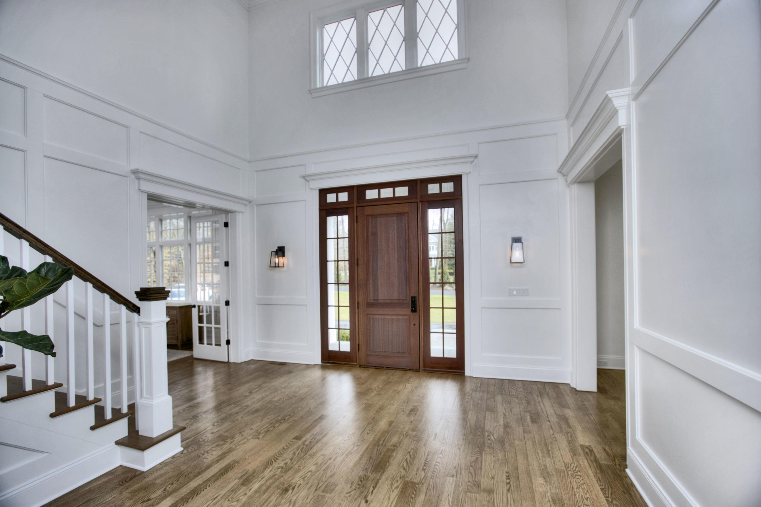 61 Stony Brook Road Darien, CT 06820 - Photo 6 of 43 a view of an empty room with wooden floor and a window
