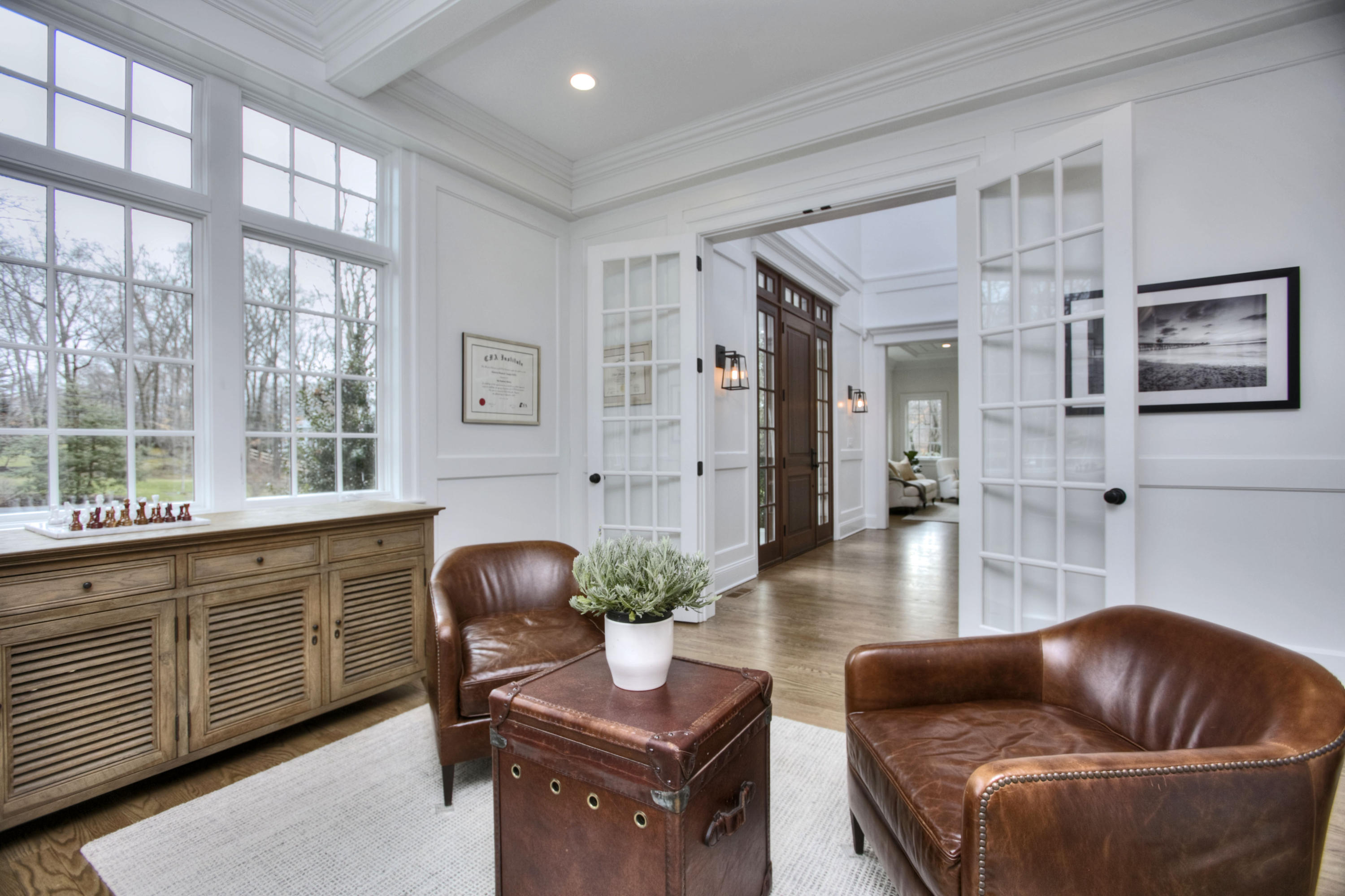 61 Stony Brook Road Darien, CT 06820 - Photo 9 of 43 a living room with furniture and a large window