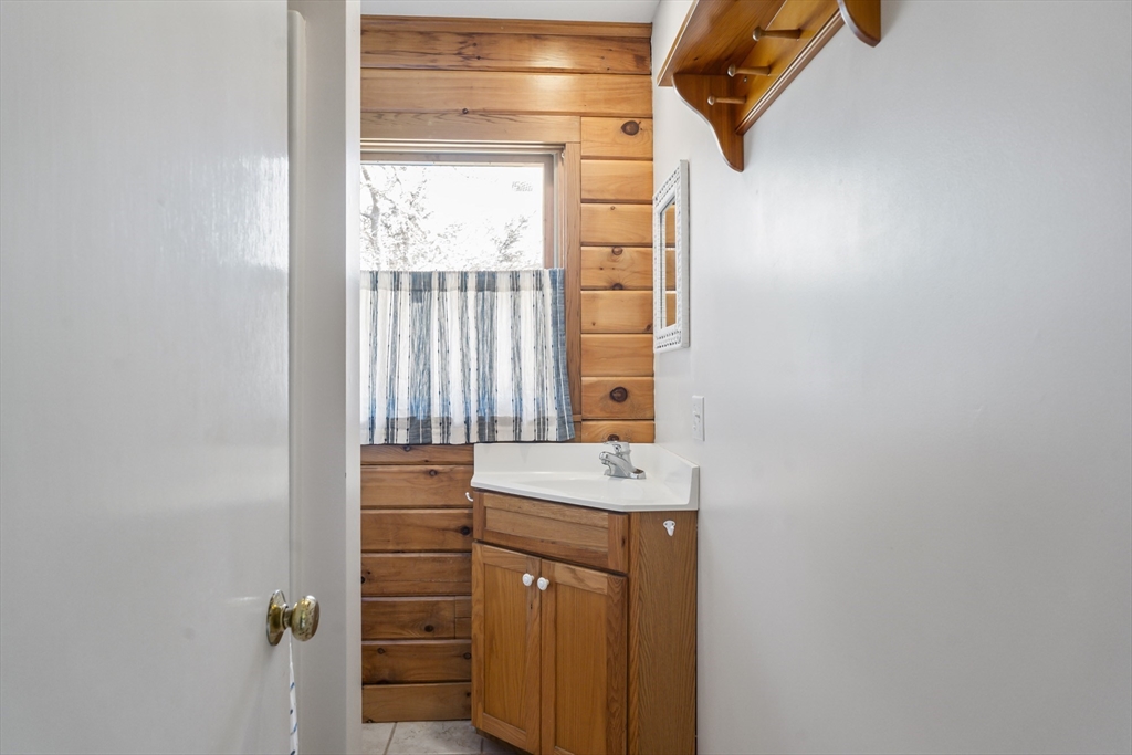 7 Pip'n Road Edgartown, MA 02539 - Photo 31 of 41 a bathroom with a sink a vanity and a shower