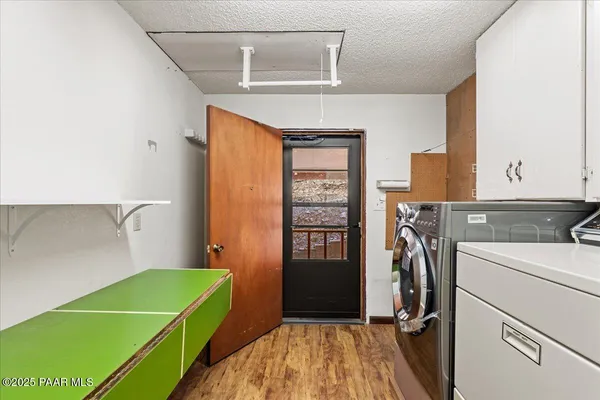 a view of a workspace with furniture