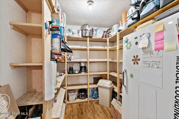 an empty room with closet area