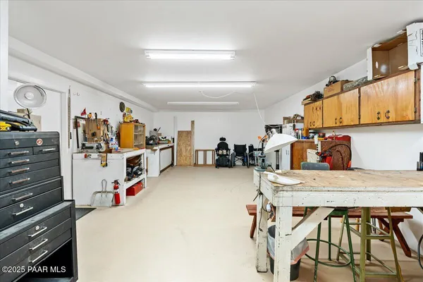 a view of a kitchen and dining room